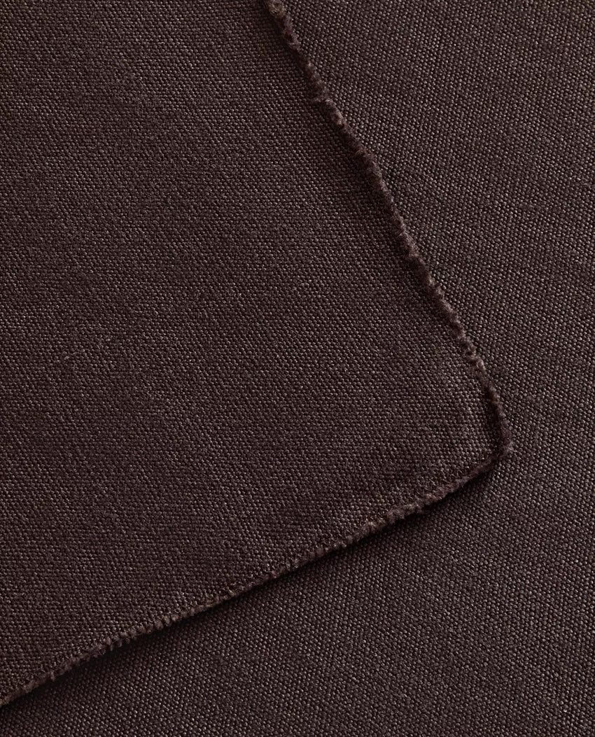 Dark-toned napkins styled for a moody table setting